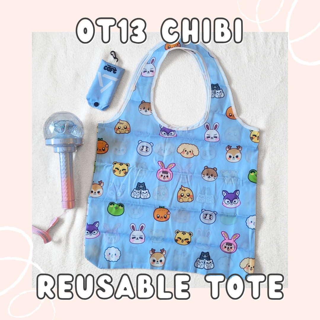 A blue tote bag with Seventeen's Miniteen characters on a white background. A 10th anniversary seventeen lightstick is on the left side. The tote storage clip-on bag is on the top-left of the image. The top text of the images says "OT13 CHIBI" and the bottom text says "REUSABLE TOTE" in white font on a light-pink background.